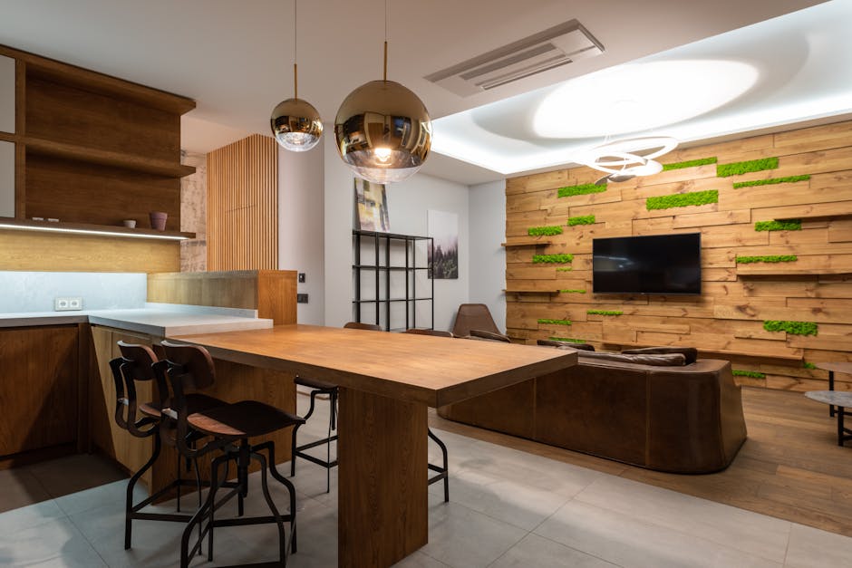 Stylish modern dining room with wood accents and contemporary lighting.