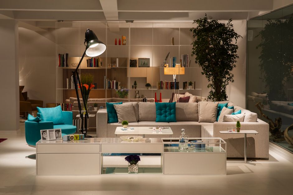 Spacious living room interior with contemporary furniture and elegant decor.