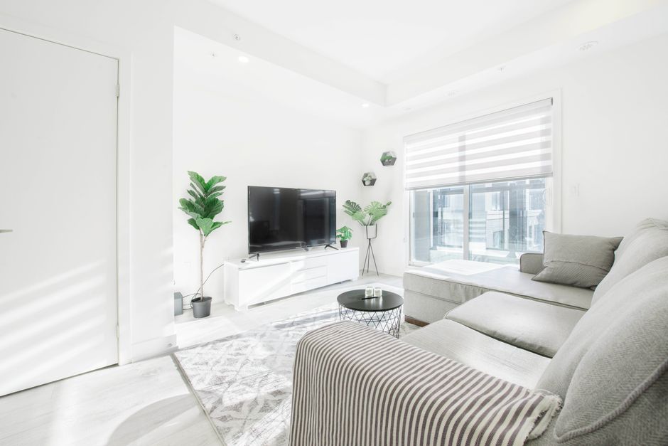 Bright and airy living room with modern minimalist decor and natural light.